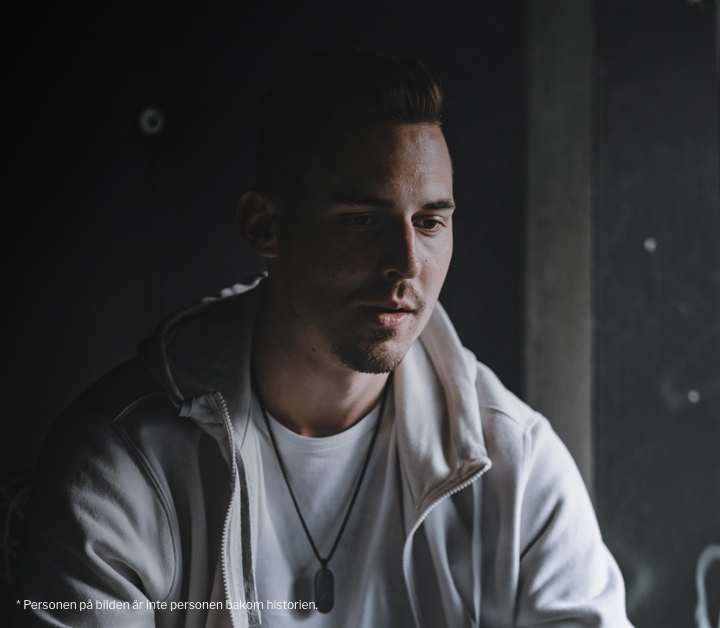 dark-shadow-half-face-man-looking-down